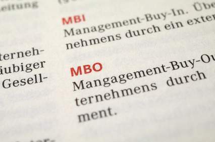 Zeitungsausschnitt eines Wirtschaftsmagazins: Definition von MBI und MBO