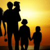 A family walking towards the sunset!