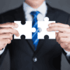Picture with puzzle pieces as a symbol for business brokers and M&A advisors